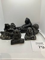 Six soap stone animal carvings displayed together