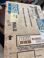 Original shipping box of the BSR McDonald 2260-X turntable with fragile markings and packaging labels.