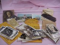 Overview of assorted vintage photographs and negatives including portraits and outdoor images