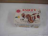 Original box for Sniffy the Nosey Puppy with colorful vintage artwork and minor wear visible.