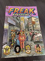 Front cover photo of Fabulous Furry Freak Brothers? #4 comic book showing colorful cartoon characters and city background