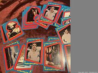 Top-down photo showing the spread of multiple Buck Rogers stickers with different characters and sci-fi images.
