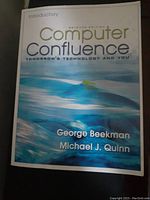 Front cover of the Computer Confluence textbook showing title, authors, and abstract blue-wave design.