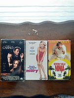 Three movie DVDs: Casino, There's Something About Mary, Beverly Hills Ninja