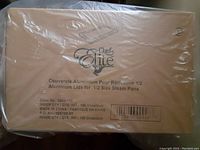 Box labeled Chef Elite Aluminum Lids for 1/2 Size Steam Pans, Quantity 100, Made in China