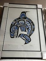 Front view of framed limited edition whale print with protective corner guards, showing artwork and numbering on the white mat.