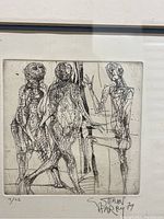 Overall view of framed and matted etching print showing three anatomical figures and frame