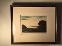 Framed mezzotint artwork showing entire piece and frame with light reflection on glass
