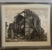 Full front view of framed etching showing ruins and details of the temple structure with people figures for scale.