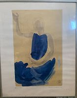 Framed artwork of a seated Cambodian dancer by August Rodin, showing graphite pencil sketch with blue gouache. Frame glass is visibly dirty with some smudges and spots.