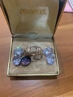 Ring in original Peoples jewelry box with loose gems visible