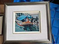 Framed colorful small fishing boat painting by Elizabeth Hollick with blue, teal, white and orange tones on water, signed by artist.