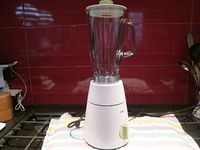 Front view of Braun MX32 blender fully assembled with glass pitcher and lid on a kitchen countertop.