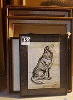 Ink drawing of a single husky dog sitting, framed with a dark border and signature S. Blyth
