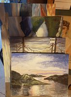 Five landscape oil paintings stacked with visible signatures, largest sized 36x25
