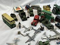 Assorted vehicles and airplanes on white background