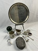 Wide shot of all lot items with green glass apple size reference