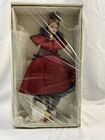 Doll sealed in original white box with clear plastic wrapping