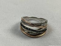 Front view on white background showing layered wires and stone rows