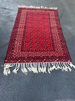 Full view of red carpet laid flat on pavement