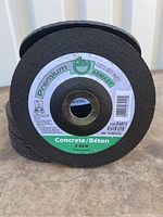 Single image showing one concrete cutting disc standing on edge, label visible.