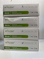 Four stacked boxes of reGentox powder free disposable nitrile gloves with green and white packaging, showing brand and product details.