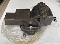 Side view of Mastercraft swivel vise showing closed jaw and swivel base.
