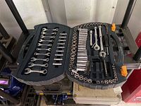 Full view of Mastercraft socket set inside black molded plastic case, showing wrenches on left and sockets on right.