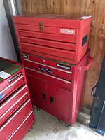 Front view of Craftsman top chest stacked on Mastercraft cart showing full lot configuration