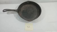 Top view of the Wagner cast iron skillet showing the entire skillet with handle on left, with number 52 label below