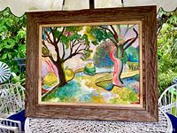 Full view of original Mid Century oil painting with colorful abstract landscape and wooden frame.