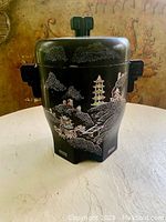 Full view of the black lacquer ice bucket showing the traditional Japanese scenery in mother of pearl inlay.