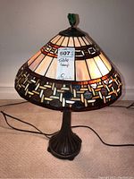 Front view showing full lamp with shade pattern and base