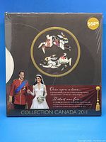 Front of sealed 2011 Canada Collection box showing royal wedding theme and stamps.