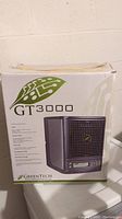 Box of the Greentech Environmental GT3000 air purifier with branding and model name visible.