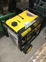 Three-quarter front view showing yellow fuel tank, black frame and wheels, and manual pouch