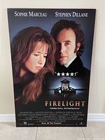 Full view of Firelight movie poster featuring lead actors Sophie Marceau and Stephen Dillane.