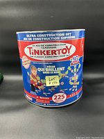 Front of Tinkertoy Ultra Construction Set with label showing 225 pieces and images of assembled models.