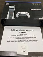 Box showing 2.4G Wireless Remote System branding and product features like double hands, support for 40 simulators, original 3D rocker, compatibility with 1000 games, high fidelity sound.