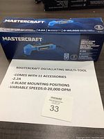 Photo of original Mastercraft oscillating multi-tool box with feature information sheet describing 11 accessories, 2.2 amp motor, 5 blade mounting positions and variable speed 0-20,000 OPM.