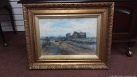 Framed watercolour painting of rural scene with building and pathway.