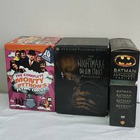 Front view showing the three boxsets side by side: Monty Python's Flying Circus, Nightmare on Elm Street Collection, Batman Anthology 1989-1997.