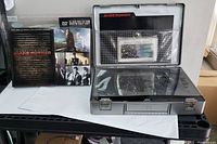 Blade Runner metal briefcase with DVDs, booklet, and certificate inside