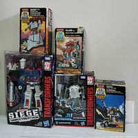 All five sealed figures displayed together