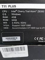 Box label showing specs: Intel Cherry Trail Atom Z8350 CPU, Windows OS, 4GB RAM, 64GB ROM, WiFi 2.4GHz & 5GHz, VGA up to 1920x1080, HDD slot supporting 2TB 2.5" drive.