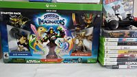 Skylanders Imaginators Xbox One box with two wireless controllers on top