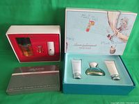 Photo showing all three cologne gift sets: Oscar de la Renta 'Oscar', Geoffrey Beene 'Grey Flannel', Tommy Bahama 'Very Cool'.