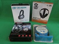 Four headphone sets in original packaging: CB3 Hush closed back headset, Pyle Home PHPW2 headphones, Panasonic wireless device headphones, Sony Walkman lightweight headphones.