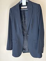 Full front view of blazer on hanger