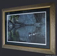 Angled view of the framed print showing artwork and frame